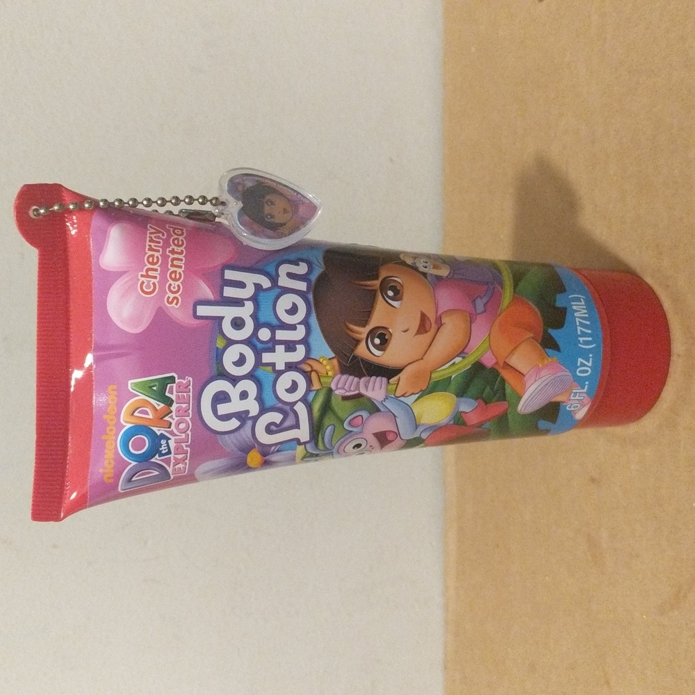 3/$30.00 Disney body lotion Dora the Explorer 6 oz w/charm 🆕